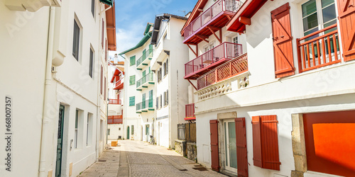 Fototapeta Naklejka Na Ścianę i Meble -  Paved street in the old center of Saint-Jean-de-Luz, France