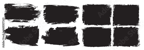 Black paint brush strokes isolated on a white background © ThejCreation