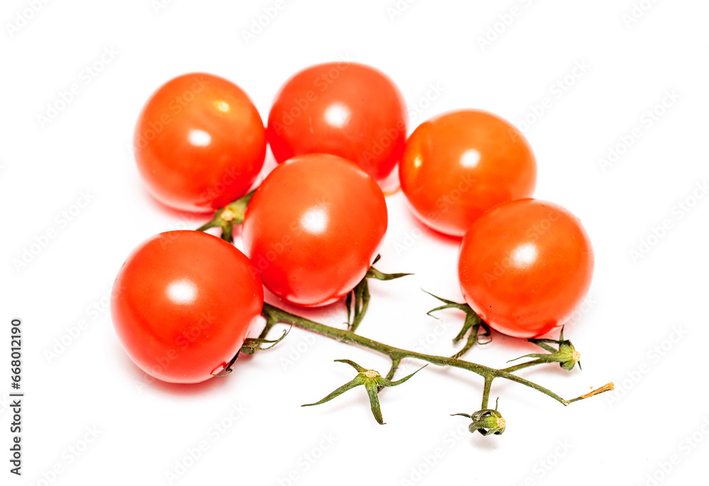 Red cherry tomatoes on a white background. Photo. Red cherry tomatoes on a white background. Photo.