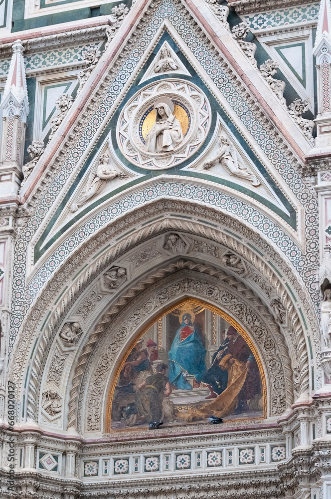 Florence, Italy - October 04, 2023: Details of the exterior of the di Santa Maria del Fiore or Cathedral of Saint Mary of the Flower - the main church of Florence, Tuscany, Italy.