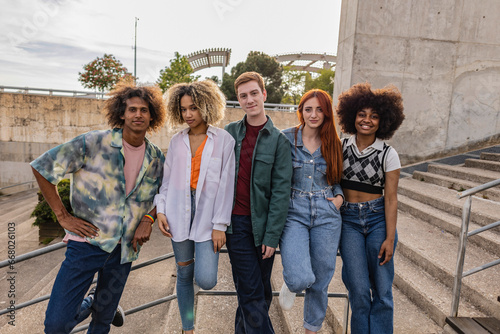 group of young multiracial generation z looking at camera