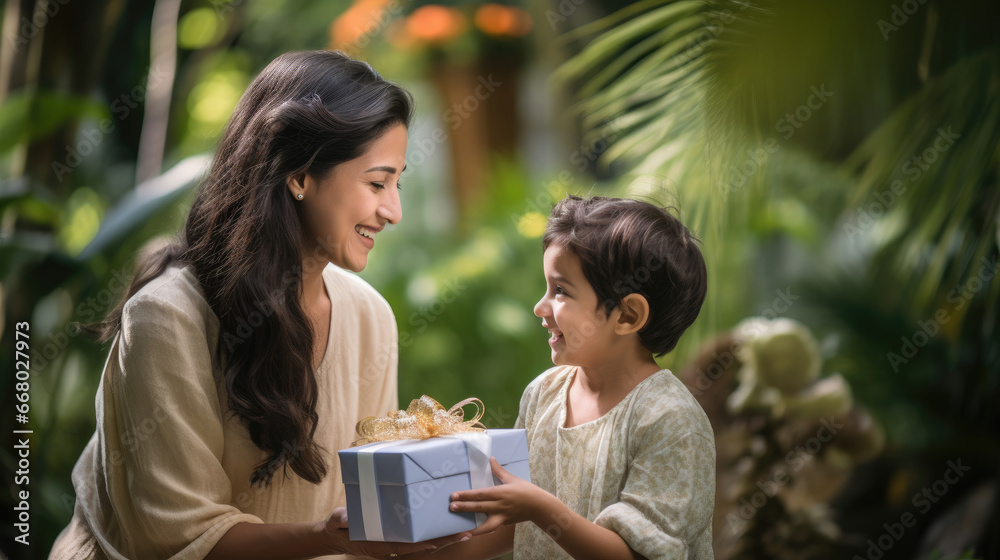 Parent hands over a beautifully wrapped present to their child recognizing hard work and dedication Parent hands over a beautifully wrapped present to their child recognizing hard work and dedication