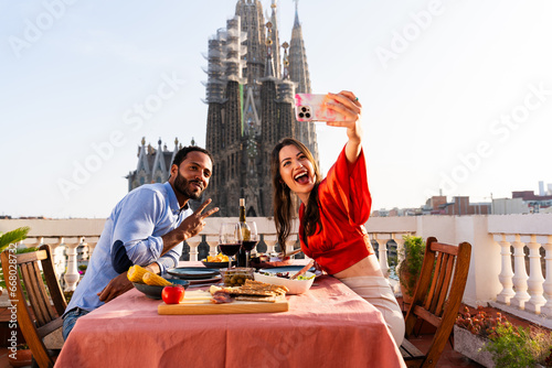 Photography Multiracial beautiful happy couple of lovers dating on rooftop balcony at Sagrad