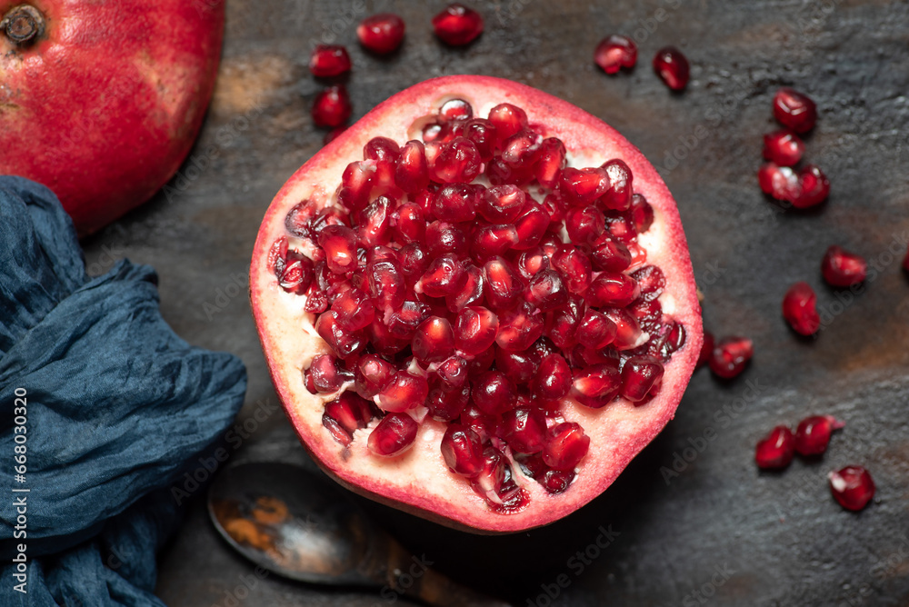 Fresh pomegranate on the kitchen table Fresh pomegranate on the kitchen table