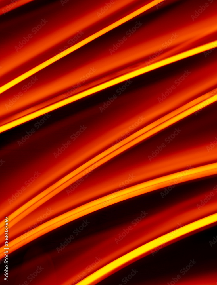 Light wave trail path, vibrant neon gold color in abstract swirls on a black background.