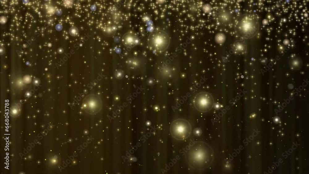 Glowing gold particle shower on black. Abstract background suitable for a variety of themes and projects.