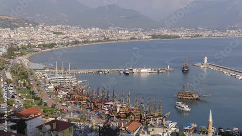 Aerial view of alanya and harbour with ships. Time-lapse.