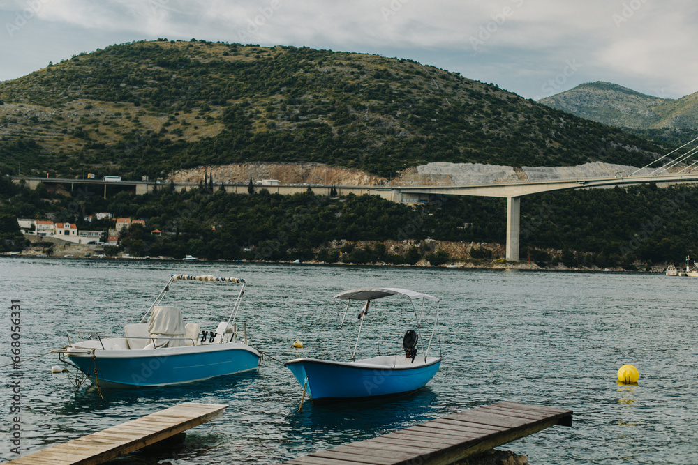 Boats in the Adriatic sea near Dubrovnik city, Croatia. Travel destination in Croatia.