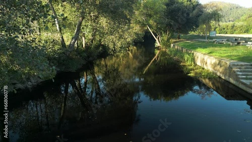 Reflections Over Waterways Of Estuario del Río Anllóns In Ponteceso, A Coruña, Galicia, Spain. Pullback Shot photo