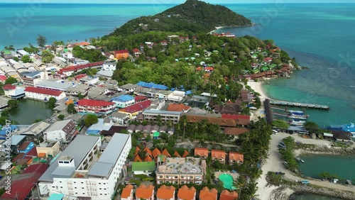 Aerial over Haad Rin, Ko Pha-Ngan Island, Thailand. Drone orbit shot photo