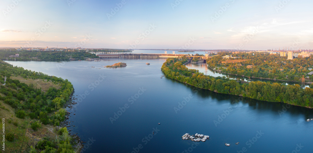 Panorama of evening Dnieper river with Dneproges hydroelectric dam in Zaporizhzhia, Ukraine, view from the 100 m height