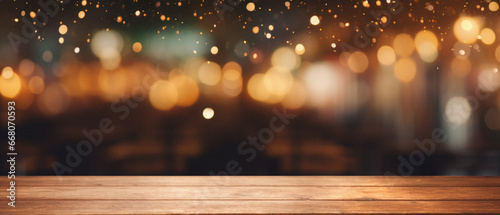 Wooden table in front of abstract blurred background of a coffee shop.