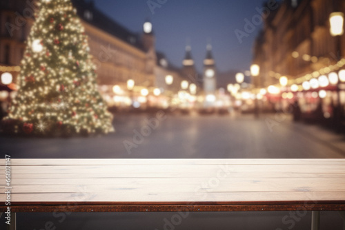 Empty wooden table over blurred christmas market background, product display mockup.