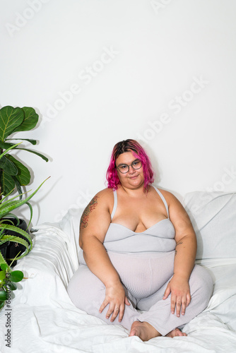 Woman relaxing sitting down on the couch meditation