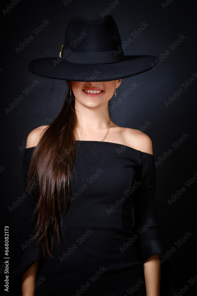 Elegant Woman in Black Hat and Off-Shoulder Dress Elegant Woman in Black Hat and Off-Shoulder Dress