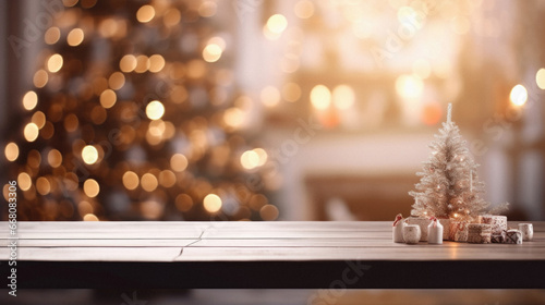 Christmas background with wooden table and christmas tree. Bokeh lights.