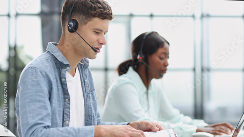operators woman and man agent with headsets working in a call center