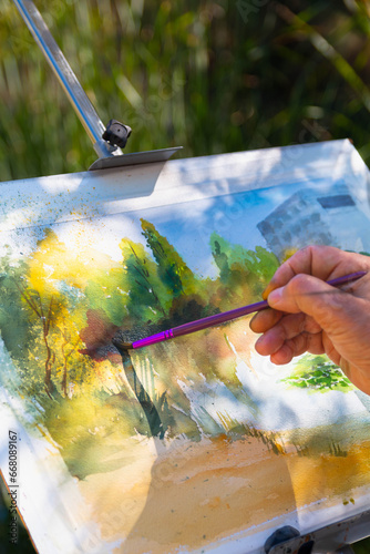 Obraz na płótnie detail of the watercolour painted in a garden with its lake
