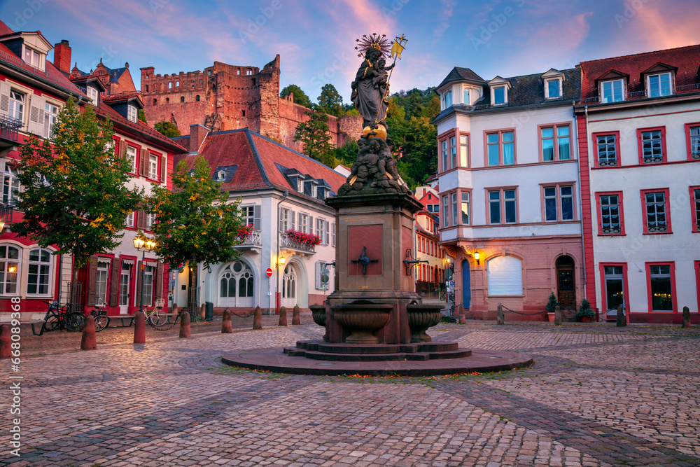 Heidelberg, Germany. Cityscape image of historical downtown of Heidelberg, Germany at beautiful autumn sunset.