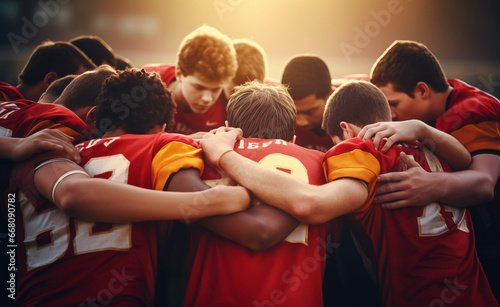 Unity and teamwork within a high school football team as the teenage boys come together. © Curioso.Photography