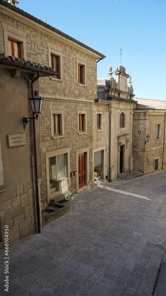 San Marino city view. Stone street and old walls in San-Marino, Italy. San Marino city view. Stone street and old walls in San-Marino, Italy.