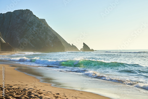 beautiful landscape of a sandy beach with transparent surf waves without people