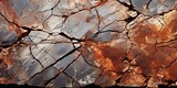 Orange red brown rock texture with cracks. Rough mountain surface. Close - up. Stone background for design. Crushed, broken, crumbled.