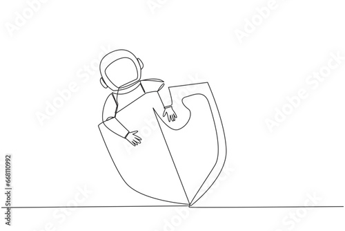 Single continuous line drawing young energetic astronaut hugging shield. Request additional protection to make expeditions in space safer. Cosmic galaxy deep space. One line design vector illustration