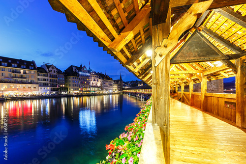 Lucerne Chapel Bridge Kapellbrücke city at Reuss river at twilight in Switzerland