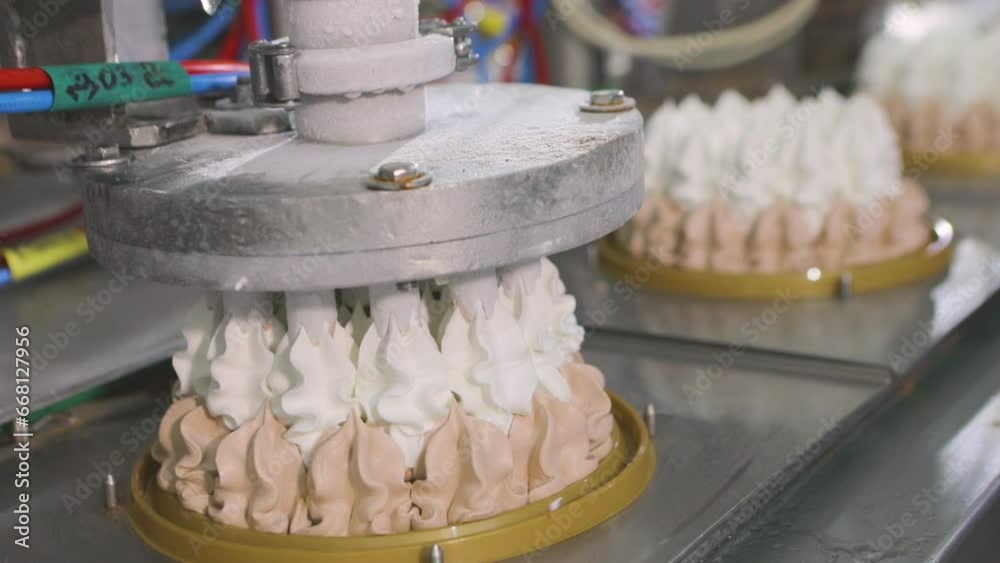 Automated conveyor for creating an ice cream cake. Automated production ...