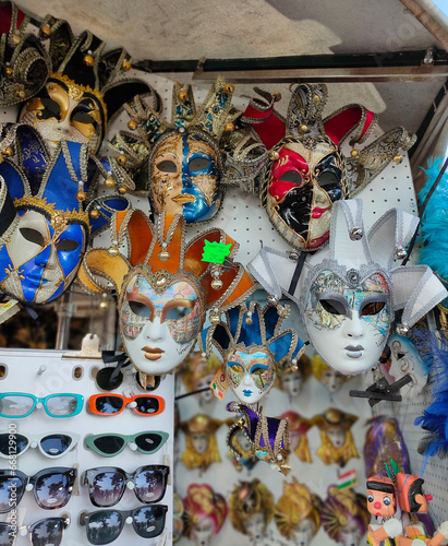 Venice, Italy - October 5, 2023: Venetian carnival masks, souvenir shop on a street photo