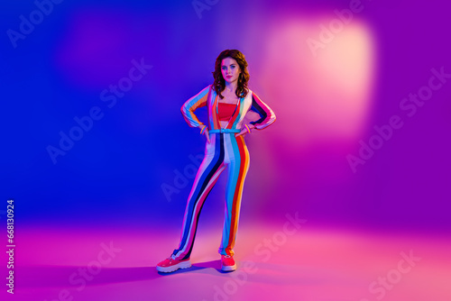 Photo of positive cool girl dressed striped overall enjoying party isolated neon pink violet color background