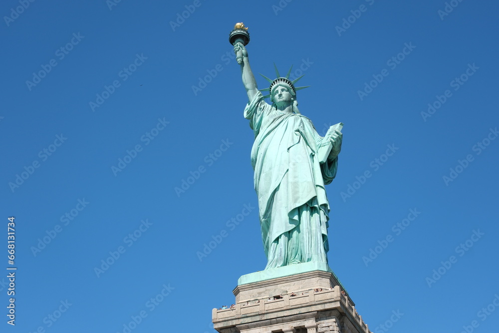 Fototapeta premium Statue of Liberty with clear sky in background