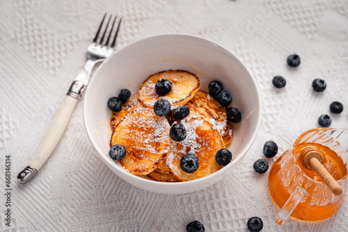 Pancake with blueberry and honey topping