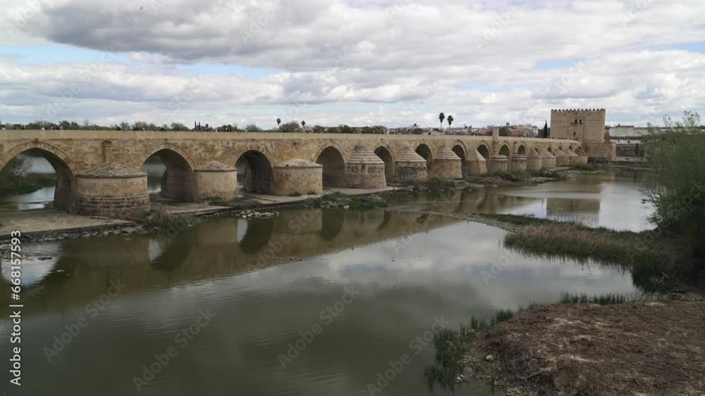 The Guadalquivir river and the Roman bridge in Cordoba, province of Andalusia, south Spain The Guadalquivir river and the Roman bridge in Cordoba, province of Andalusia, south Spain