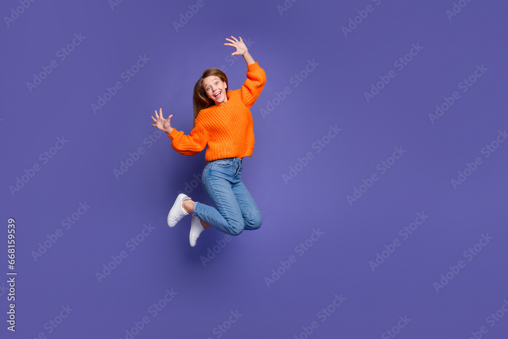 Full length body photo of funny teen girl jumping air showing fingers ten number sign big sale banner isolated on violet color background Full length body photo of funny teen girl jumping air showing fingers ten number sign big sale banner isolated on violet color background