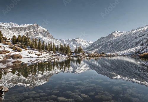 Crystal clear lake reflecting snow capped Sierra Nevada mountains. © Rao Saad Ishfaq