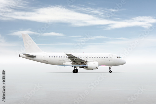 White passenger jetliner isolated on bright background with sky