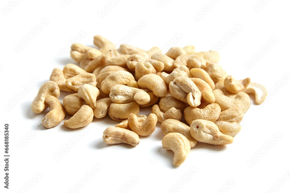 Cashew nut heap isolated on white background. Isolated cashews, ready to munch Cashew nut heap isolated on white background. Isolated cashews, ready to munch