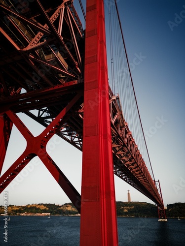 Fototapeta Naklejka Na Ścianę i Meble -  Vertical shot of the 25 April bridge in Lisbon, Portugal