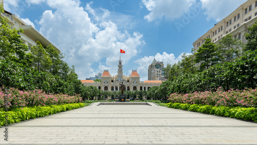 Ho Chi Minh Statue and People's Committee of Ho Chi Minh City in Nguyen Hue walking street. 