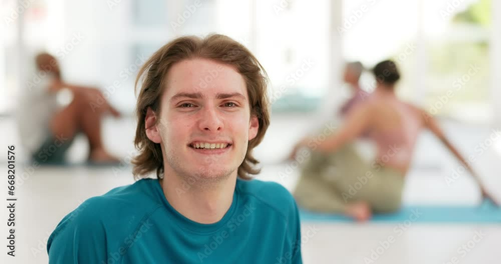 Man, face and smile with yoga for fitness, exercise or wellness in gymnasium or center with happiness. Person, portrait and guy for pilates, workout or training in gym or studio for mental health