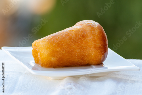 Fresh baked italian dessert homemade rum baba soft cake close up