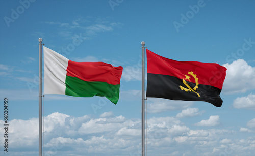 Madagascar and Angola national flags, country relationship concept