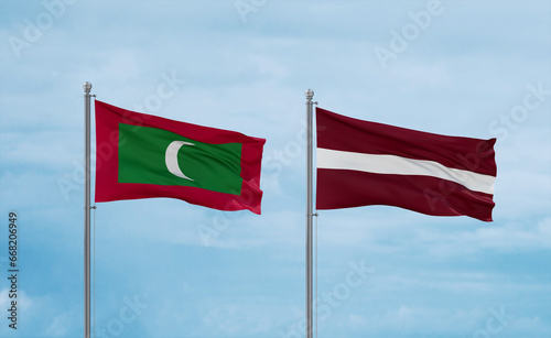 Latvia and Maldives flags, country relationship concept