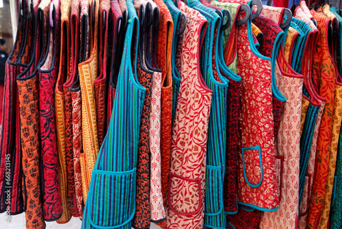Traditional clothing for sale in Dilli Haat craft market, New Delhi, India photo