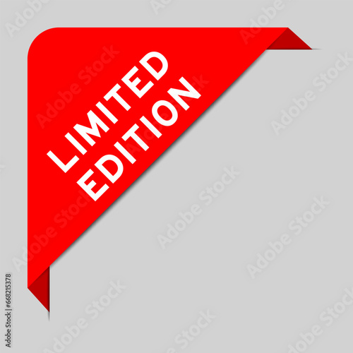 Red color of corner label banner with word limited edition on gray background