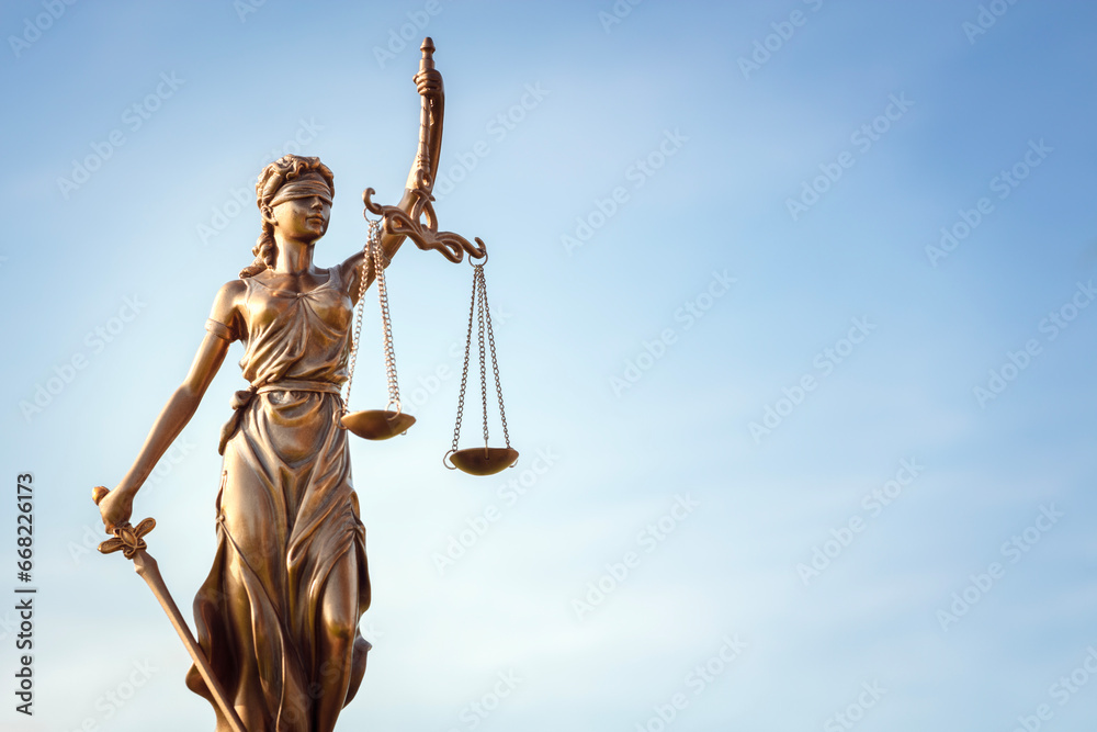 Legal law concept statue of Lady Justice with scales of justice with blue sky background - obrazy, fototapety, plakaty 