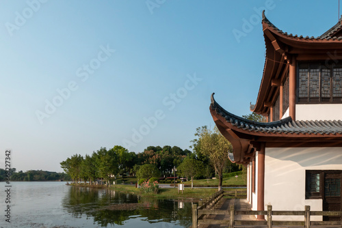 The attic of ancient Chinese architecture on the lake