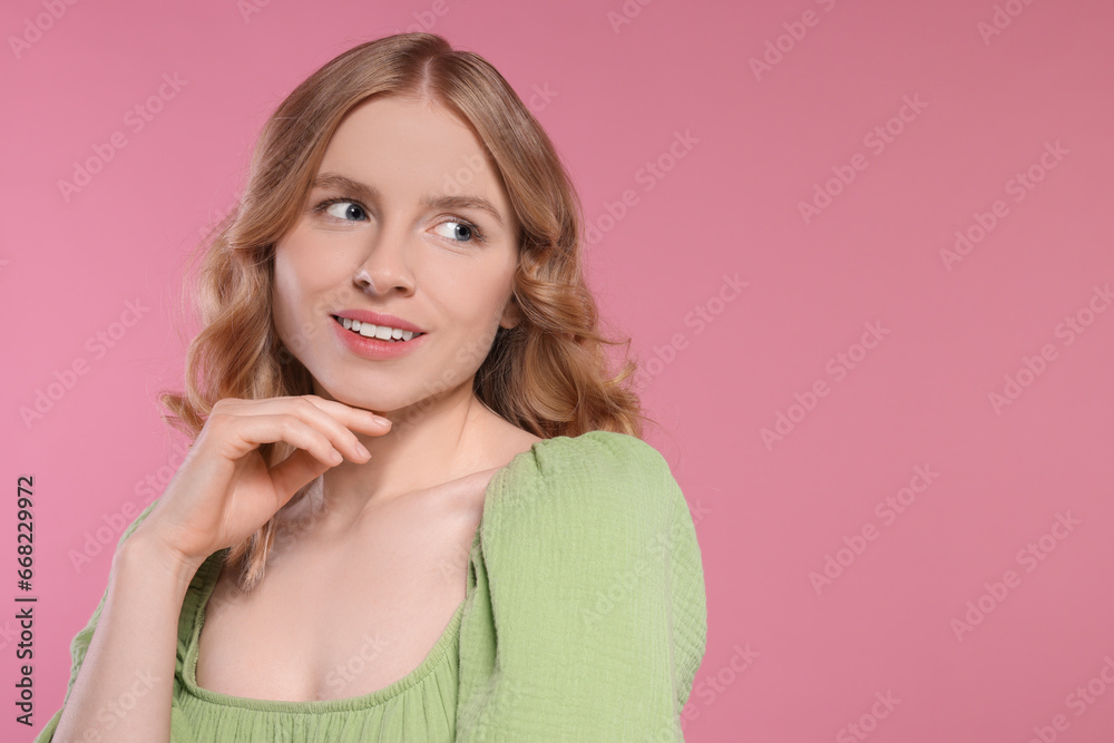Portrait of beautiful woman with blonde hair on pink background. Space for text Portrait of beautiful woman with blonde hair on pink background. Space for text